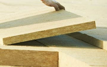 measuring Humble Green tapered insulation